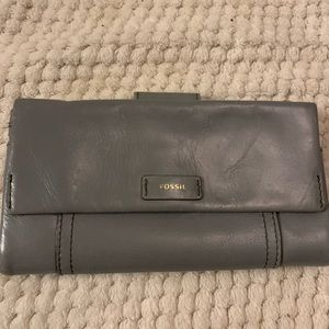 Light grey/blue fossil wallet.